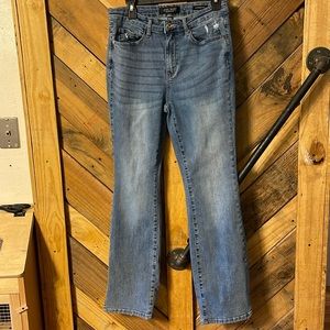 Judy Blue Slim Bootcut 11/30 slit bottom of leg.